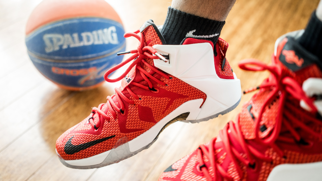 Basketball sneakers just above the court