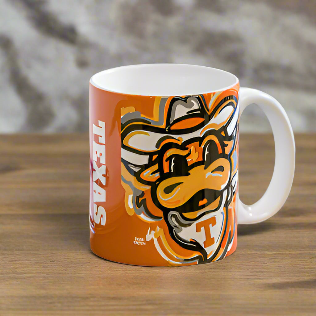 Texas Longhorns coffee mug on a desk