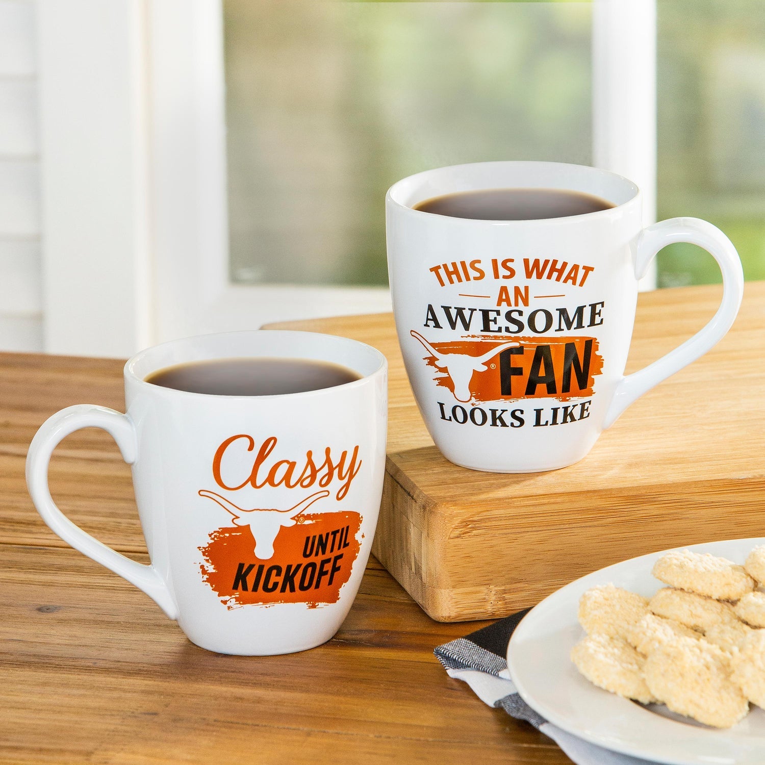 University of Texas, Ceramic Cup Coffee cups on a counter with a plate of cookies