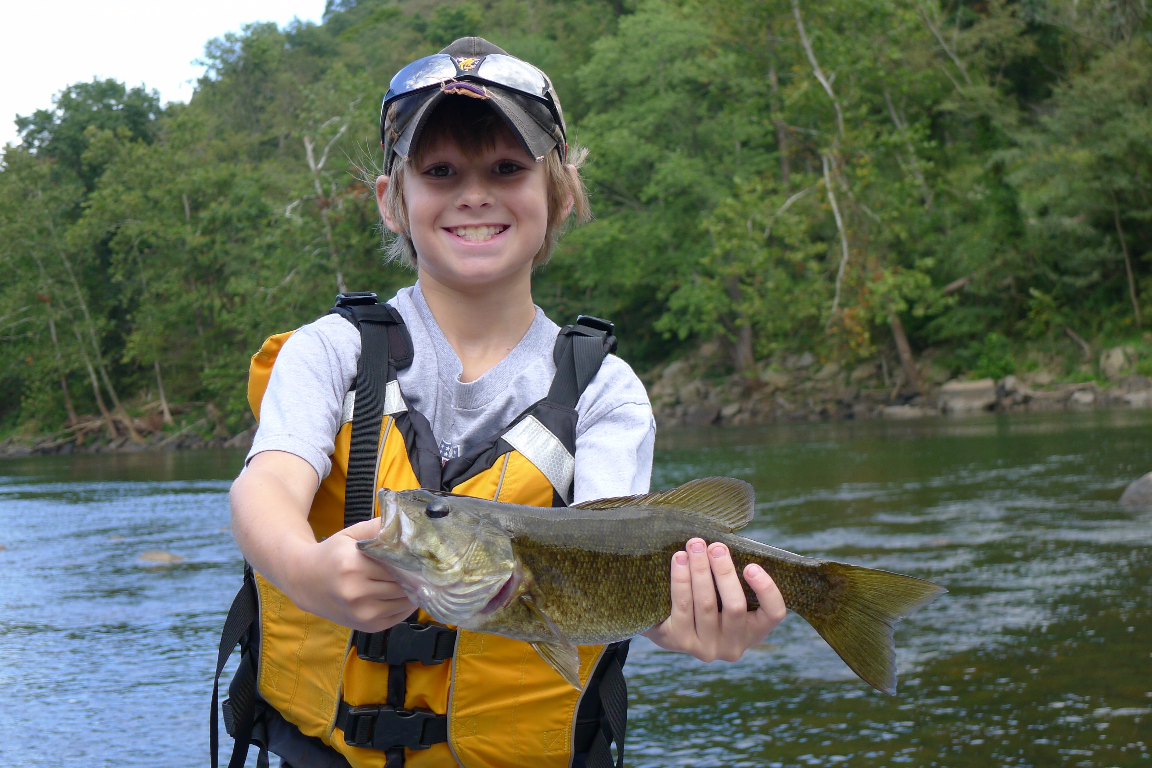 Charlie holding small mouth bass